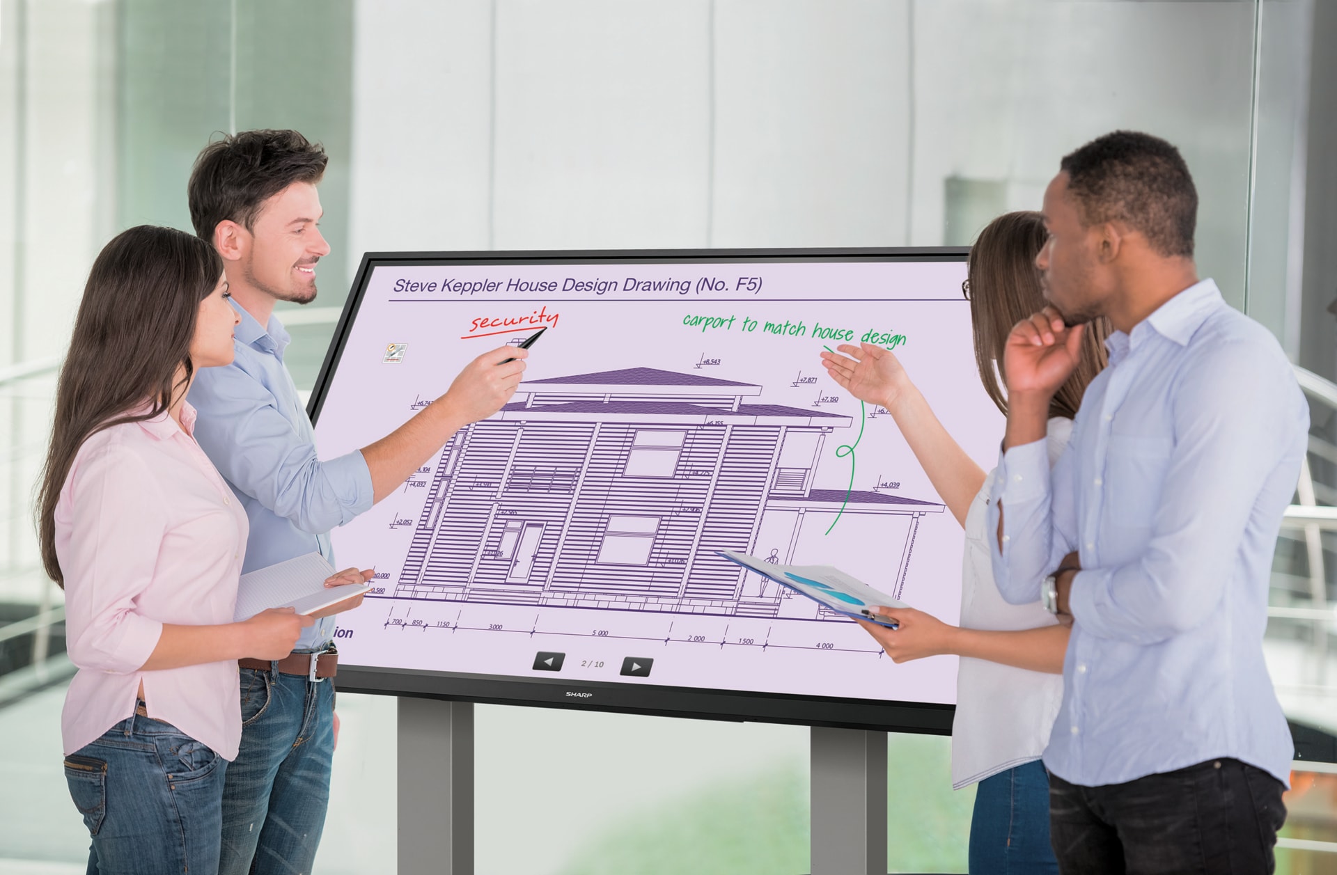 Sharp/NEC's Collaboration Display Solutions showing team sketching plan